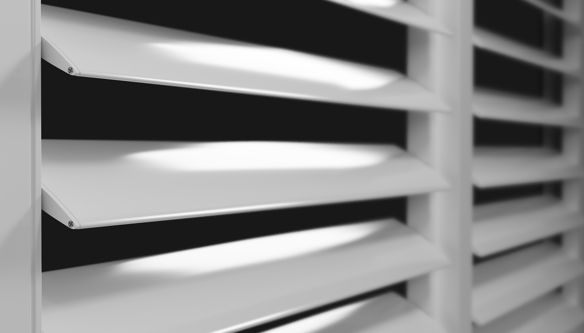 White window blinds with horizontal slats angled to allow partial light through.